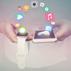 Apple wrist watch connecting to iPhone - the basis of omnichannel marketing strategy.