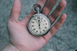 Stopwatch in the palm of a hand