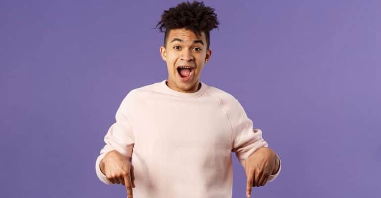 Enthusiastic person and purple background.