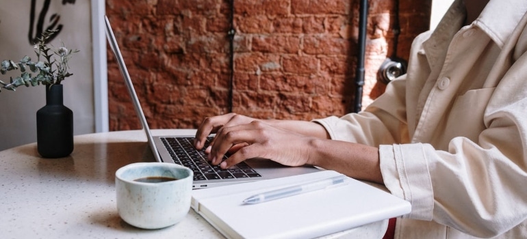 a woman working on her laptop 