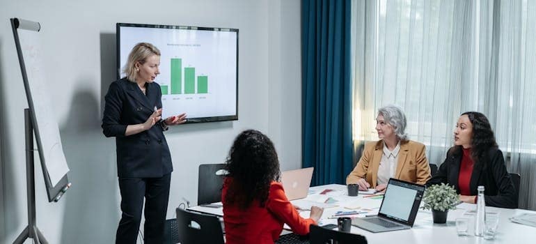 A meeting with experts discussing how to increase profit margins for your moving company