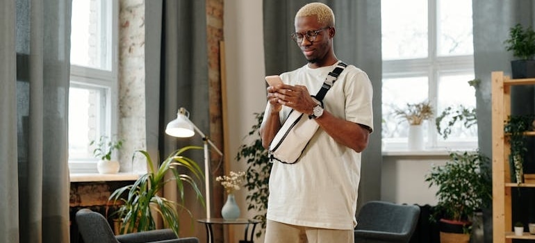 A person using one of the best apps for moving available today