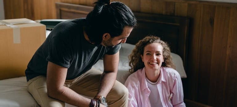Couple planning their move with the best apps for moving available today