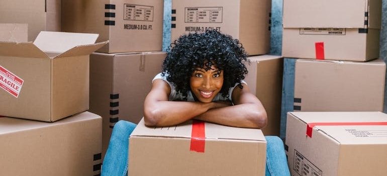 A person packing boxes after hiring movers that know the best places to advertise a company